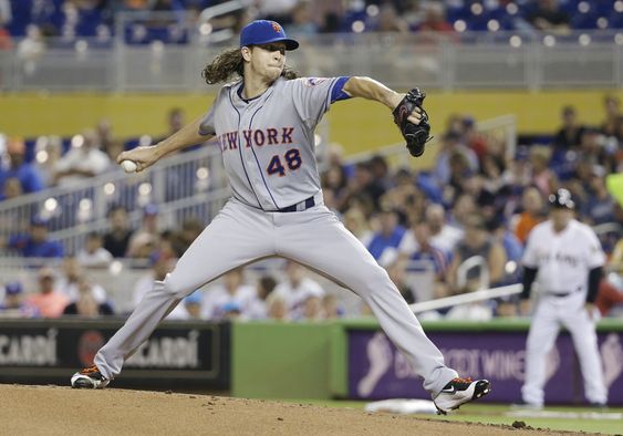 Jacob de Grom delivers a pitch during the first inning of a baseball game against the Miami Marlins Friday Sept. 4 2015 in Miami