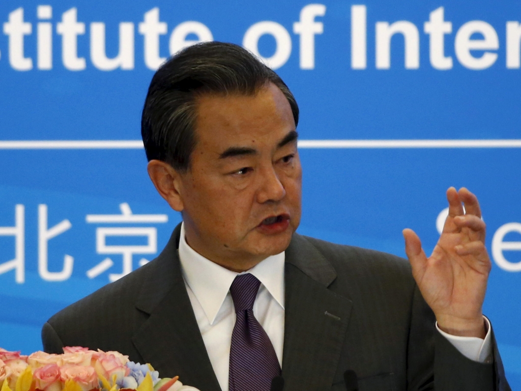 Chinese Foreign Minister Wang Yi delivers a speech during the international seminar commemorating the 10th anniversary of the September 19 joint statement of six-party talks at the Diaoyutai State Guesthouse in Beijing China on Saturday