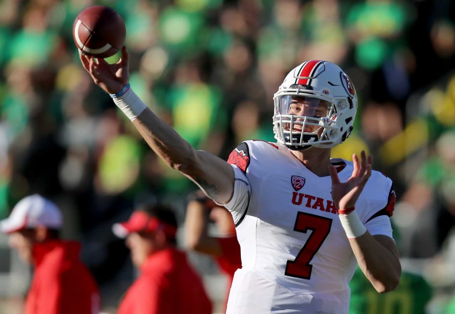 Utah quarterback Travis Wilson warms up before the start of an NCAA college football game against Oregon Saturday Sept. 26 2015 in Eugene Ore