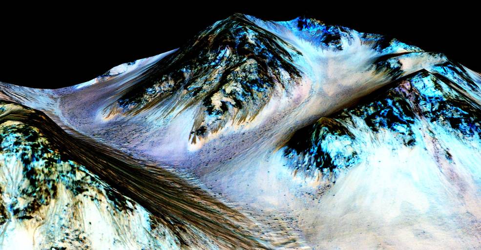 These dark narrow 100 meter-long streaks called recurring slope lineae flowing downhill on Mars are inferred to have been formed by contemporary flowing water. Recently planetary scientists detected hydrated salts on these slopes at Hale crater corrob