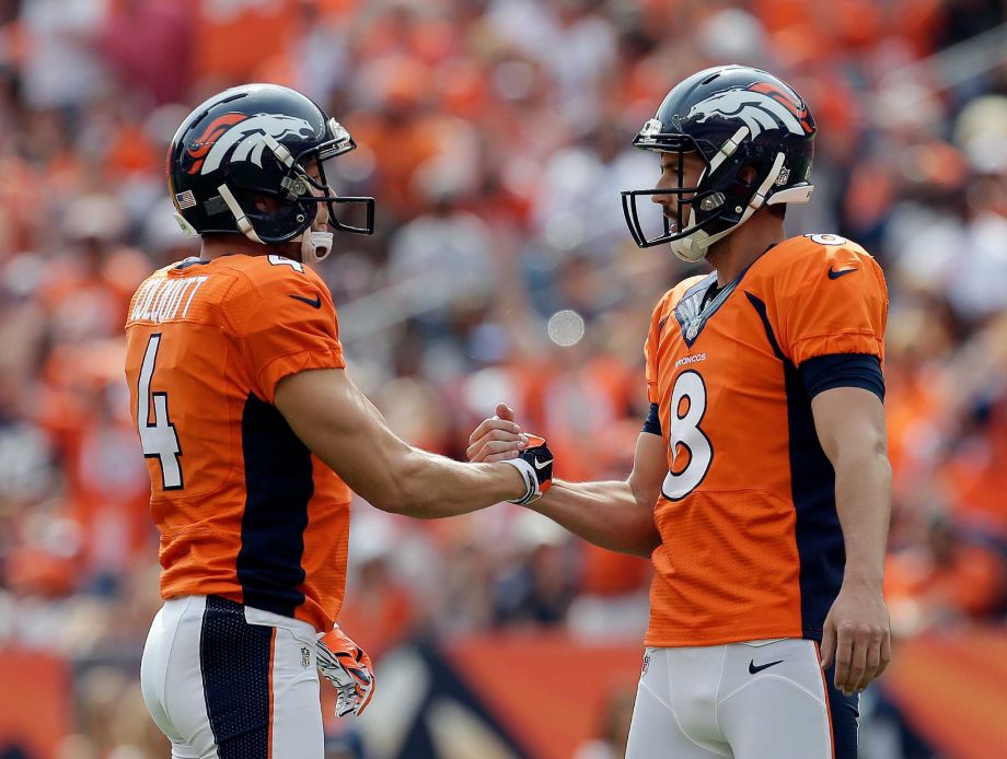 Denver Broncos kicker Brandon McManus right celebrates his field goal with Britton Colquitt during the first half of an NFL football game against the Baltimore Ravens Sunday Sept. 13 2015 in Denver