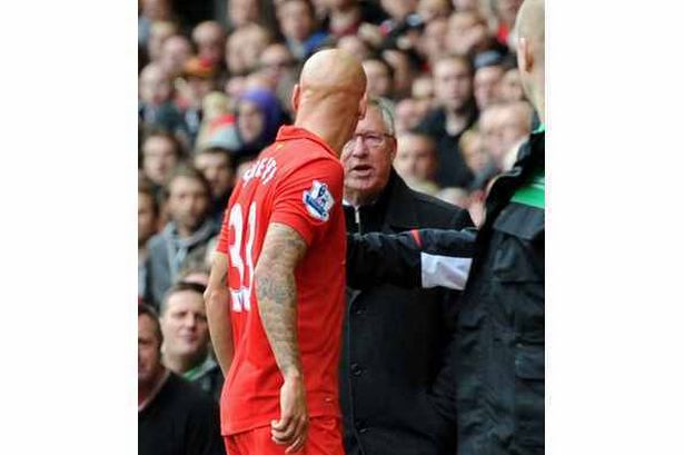 Liverpool FC v Manchester United Premier League Match at Anfield. Shelvey has a go at Sir Alex Ferguson as he is sent off