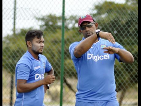 Video WiCB West Indies head coach Phil Simmons and leg-spinner Devendra Bishoo at a net session in Antigua and Barbud