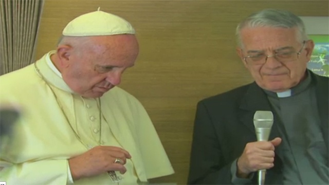 Pope Francis on airplane