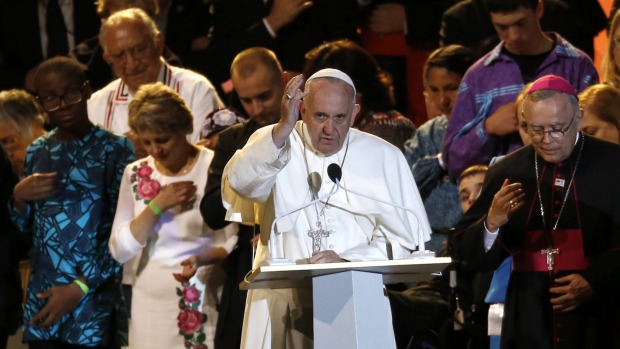 Pope Francis makes the sign of the cross during the closing ceremony for the World Meeting of Families in Philadelphia