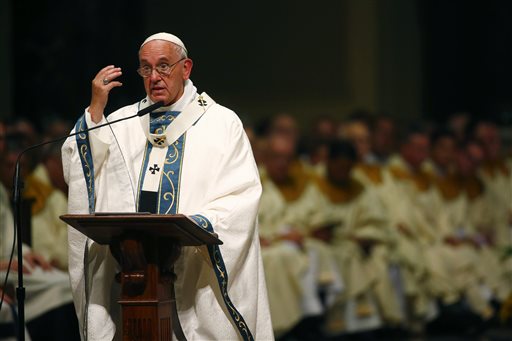 Pope Francis celebrates Mass at the Cathedral Basilica of Sts. Peter and Paul Saturday Sept. 26 2015 in Philadelphia. Francis rode by motorcade to the downtown Cathedral and celebrated a Mass for about 1,600 people. In his homily he said the future