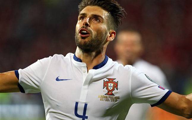 Portugal's Miguel Veloso celebrates after scoring a goal against Alabania