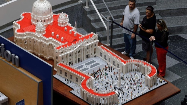 The Lego Vatican on display at the Franklin Institute in Philadelphia includes a tiny pope a mini St. Peter's square crowded with Lego tourists and Swiss Guards- even a nun wielding a selfie stick