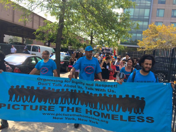 Protesters march against the NYPD's recent crackdown on the homeless