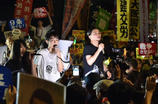 Members of SEALDs stage a rally against Japanese Prime Minister Shinzo Abe's controversial security bills in front of the National Diet in Tokyo