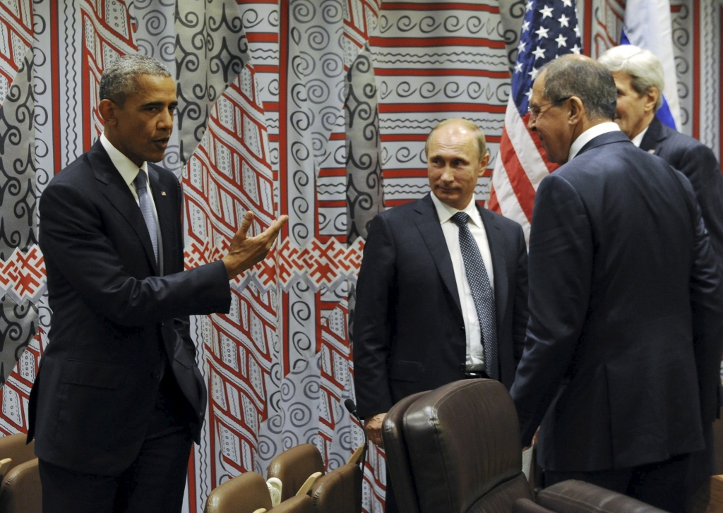 Russia's President Vladimir Putin, Foreign Minister Sergei Lavrov, U.S. President Barack Obama and U.S. Secretary of State John Kerry attend a meeting on the sidelines of the United Nations General Assembly in New York September 28