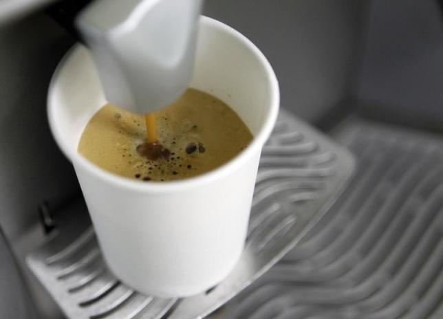 REUTERS  Gleb GaranichA coffee machine pours coffee into a paper cup in Kiev