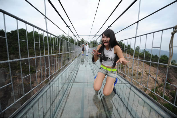 Woman scared on bridge