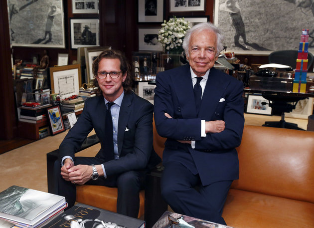 Designer Ralph Lauren right poses in his office with Stefan Larsson global brand president for Old Navy Tuesday Sept. 29 2015 in New York. Lauren is stepping down as CEO of the fashion and home decor empire that he founded nearly 50 years ago and