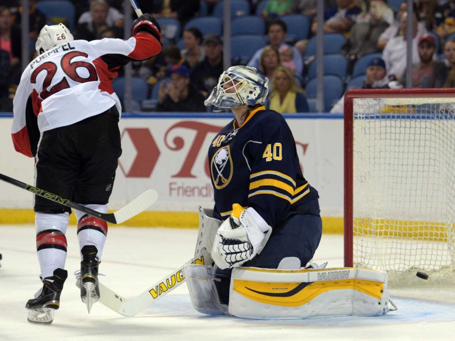 Ottawa Senators left winger Matt Puempel celebrates a goal by Alex Chiasson while Buffalo Sabres goaltender Robin Lehner reacts during the second period of an NHL preseason hockey game Wednesday Sept. 23 2015 in Buffalo N.Y