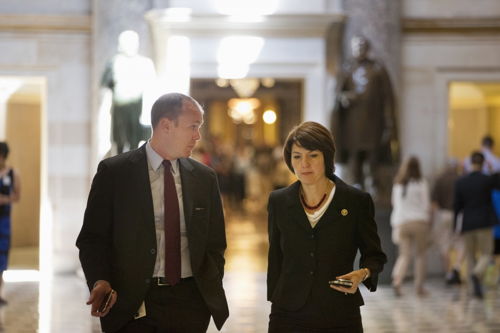 Rep. Cathy Mc Morris Rodgers R-Wash. right walks to a vote on Capitol Hill in Washington