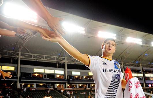 Los Angeles Galaxy midfielder Steven Gerrard greets fans following the 3-2 victory against FC Dallas at Stub Hub Center. Credit Gary A. Vasquez-USA TODAY Sports