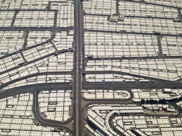 Tents for pilgrims attending the annual Haj pilgrimage are seen from a helicopter over Mina in Saudi Arabia on Friday a day after the stampede- the death toll of which has risen to 769. At least 18 Pakistanis were among those killed in the tragedy off