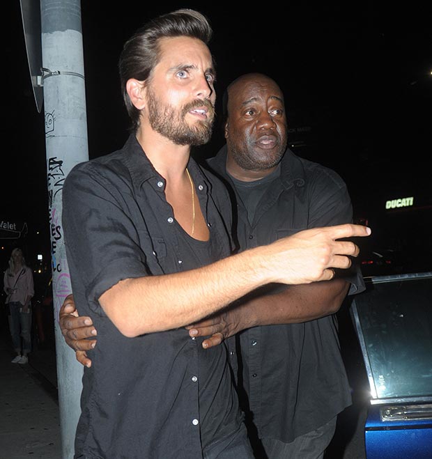 Scott Disick Wrangles Women At Club