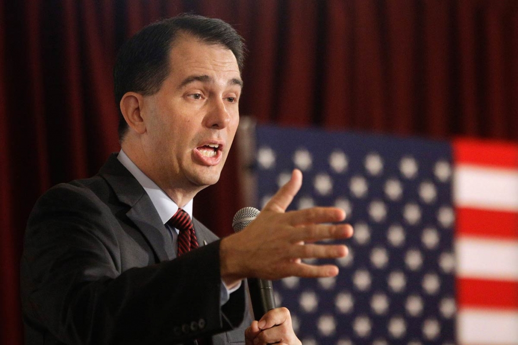 Republican presidential candidate Wisconsin Gov. Scott Walker speaks to supporters at Eureka College during a campaign stop Thursday Sept. 10 2015 in Eureka Ill