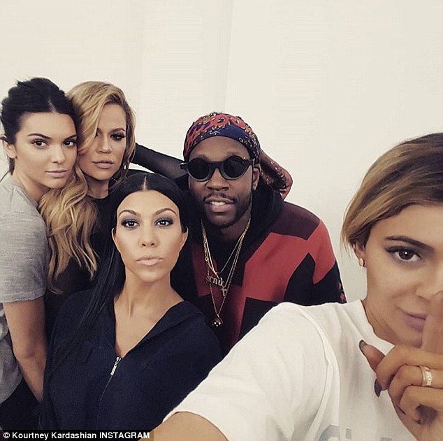 Sister act! The eldest Kardashian sisters shared a snap of herself with Kendall Jenner Khloe Kardashian 2 Chainz and Kylie Jenner on Wednesday