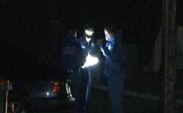 A man is under police guard in hospital after a woman's body was found at a home in Sydney's west