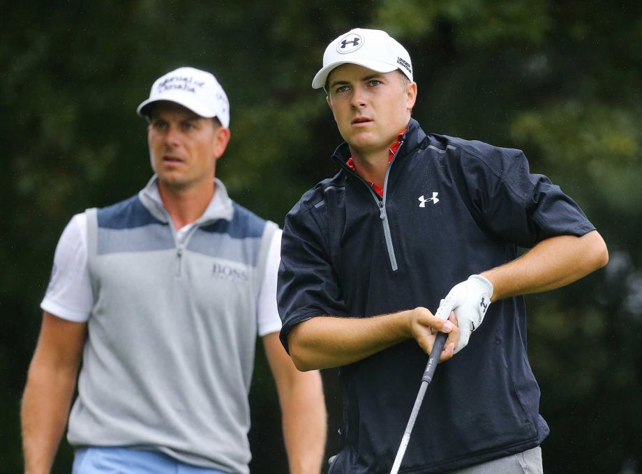 Jordan Spieth right watches his drive on the 3rd tee with Henrik Stenson looking on in the third round of the Tour Championship at East Lake Golf Club in Atlanta on Saturday Sept. 26 2015