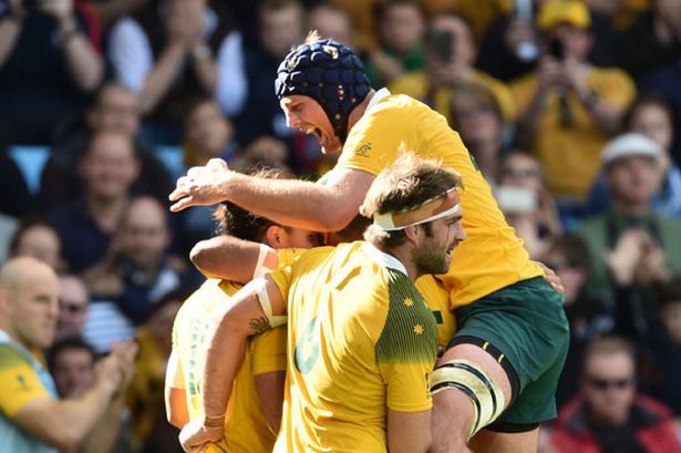 Australia's lock Dean Mumm celebrates after Australia's centre Matt Toomua scored a try during a Pool A match of the 2015 Rugby World Cup between Australia and Uruguay at Villa Park