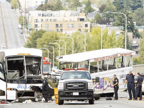 Four students killed after tour buses collide on Seattle bridge