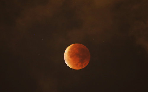 Supermoon, lunar eclipse combine for rare event