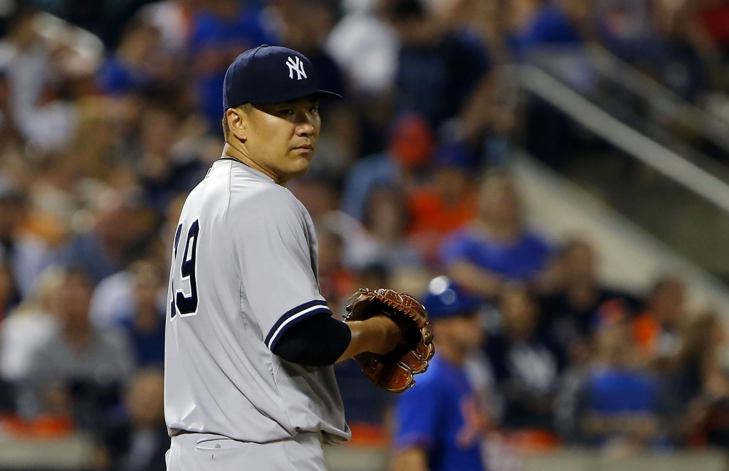 Sep 18 2015 New York City NY USA New York Yankees starting pitcher Masahiro Tanaka looks at outfield after giving up a home run to New York Mets second baseman Daniel Murphy in the sixth inning at Citi Field. Mandatory Credit Noa