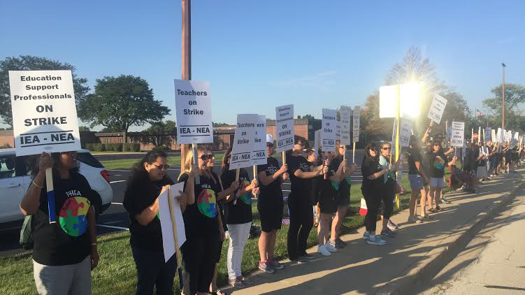 Teachers from Prospect Heights School District 23 walk the picket line after going on strike