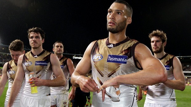 The Hawks leave the field after their loss to West Coast at Domain Stadium