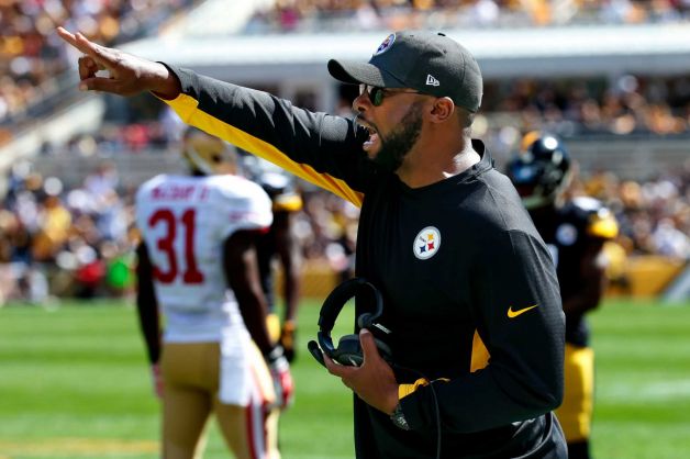 Pittsburgh Steelers coach Mike Tomlin yells instructions from the sideline during an NFL football game between the Steelers and the San Francisco 49ers in Pittsburgh. The Steelers converted a pair of 2-pointers