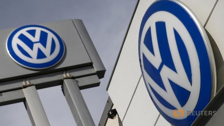 The logos of German carmaker Volkswagen is seen at a VW dealership in the Queens borough of New York