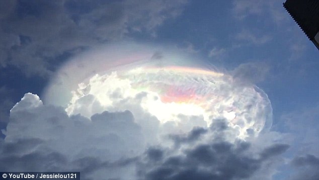 The luminous cloud formation was spotted by mystified residents in Costa Rica's capital of San Jose