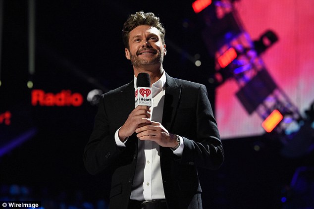 There he is! Ryan Seacrest looked right at home as he took to the stage