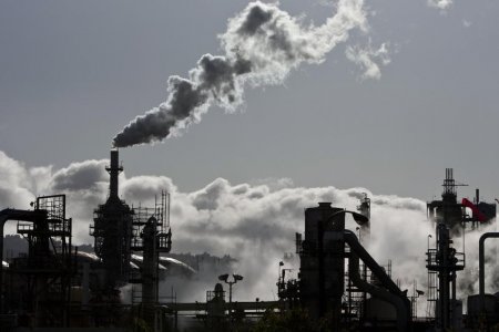 Smoke is released into the sky at a refinery in Wilmington California