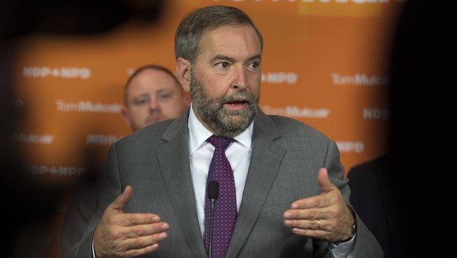 NDP Leader Tom Mulcair fields questions from reporter at a campaign rally in St. John's N.L. on Sunday