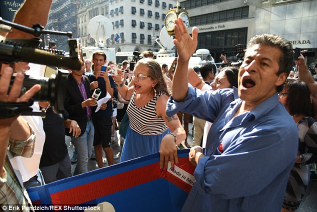 Freedom of speech Mexican immigrant Efraín Galicia 50, got into a fight with a Trump security guard on Thursday after the security guard stole his banner reading'Make America Racist Again