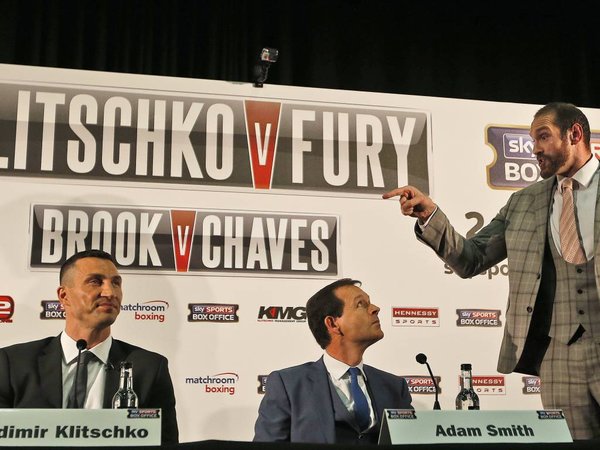 World Heavyweight boxing champion Wladimir Klitschko left is theatned by British heavyweight Tyson Fury right during a press conference in London Wednesday Sept. 23 2015. Klitschko will fight Fury in a heavyweight title bout on Oct. 24 in Duessel