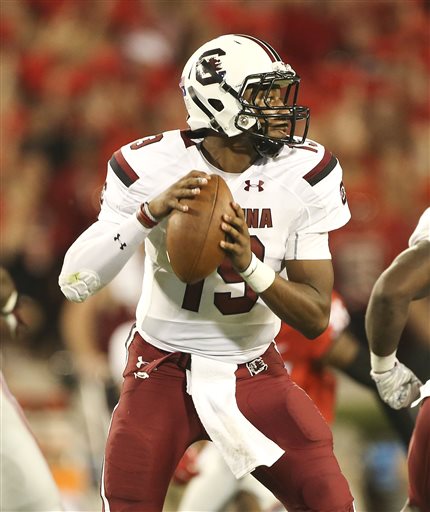 South Carolina quarterback Lorenzo Nunez drops back to throw in the second half of an NCAA college football game against Georgia in Athens Ga. South Carolina will start its third different quarterback Saturday