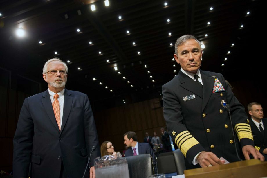 Assistant Defense Secretary of Defense for Asian and Pacific Security Affairs David Shear left and Adm. Harry Harris Jr. US Navy Commander U.S. Pacific Command take their seats on Capitol Hill in Washington Thursday Sept. 17 2015 prior to testif