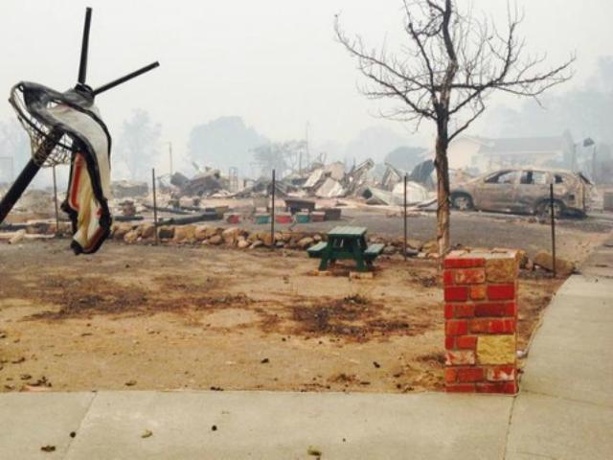 Woman survives Valley Fire at home with dogs