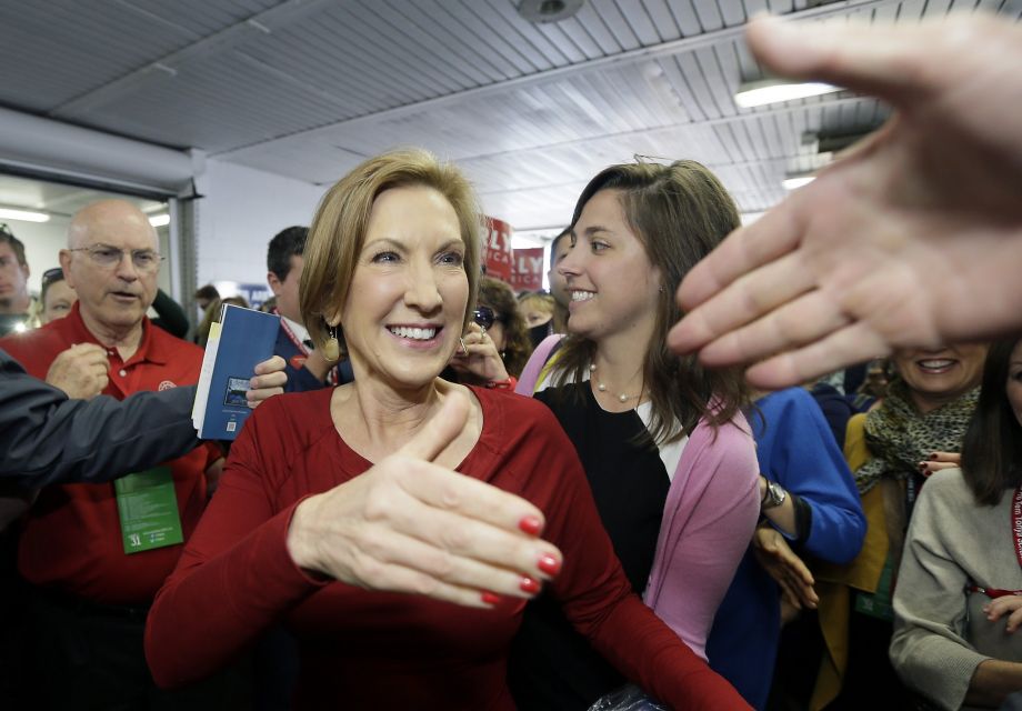 Republican presidential candidate businesswoman Carly Fiorina greets supporters as she arrives for the 2016 Mackinac Republican Leadership Conference Saturday Sept. 19 2015 in Mackinac Island Mich