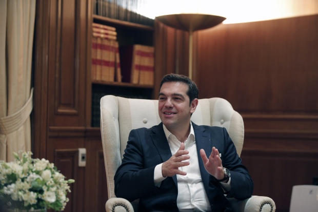 Greece Tsipras names cabinet hands top job to pro-euro economist Tsakalotos