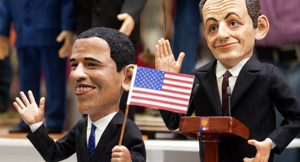 Puppets of US President Barack Obama and former French President Nicolas Sarkozy are seen on display at the international puppet exhibition in Moscow Russia Thursday Oct. 6 2011