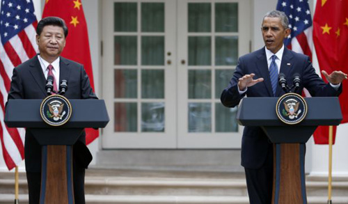 President Barack Obama gestures during a joint news conference with Chinese President Xi Jinping in the Rose Garden of the White House in Washington on Sept. 25 2015. /AP