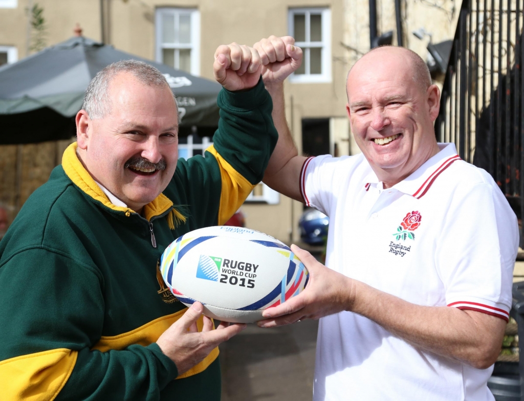 Billy Daley left landlord of The Crown in Cirencester and Dave Watson from the Wheatsheaf in their Australia and England rugby shirts ahead of the World Cup