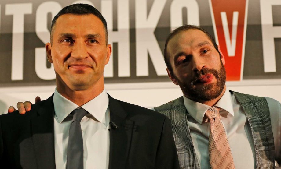 WBA WBO IBF and IBO heavyweight boxer Wladimir Klitschko left and British heavyweight Tyson Fury pose for